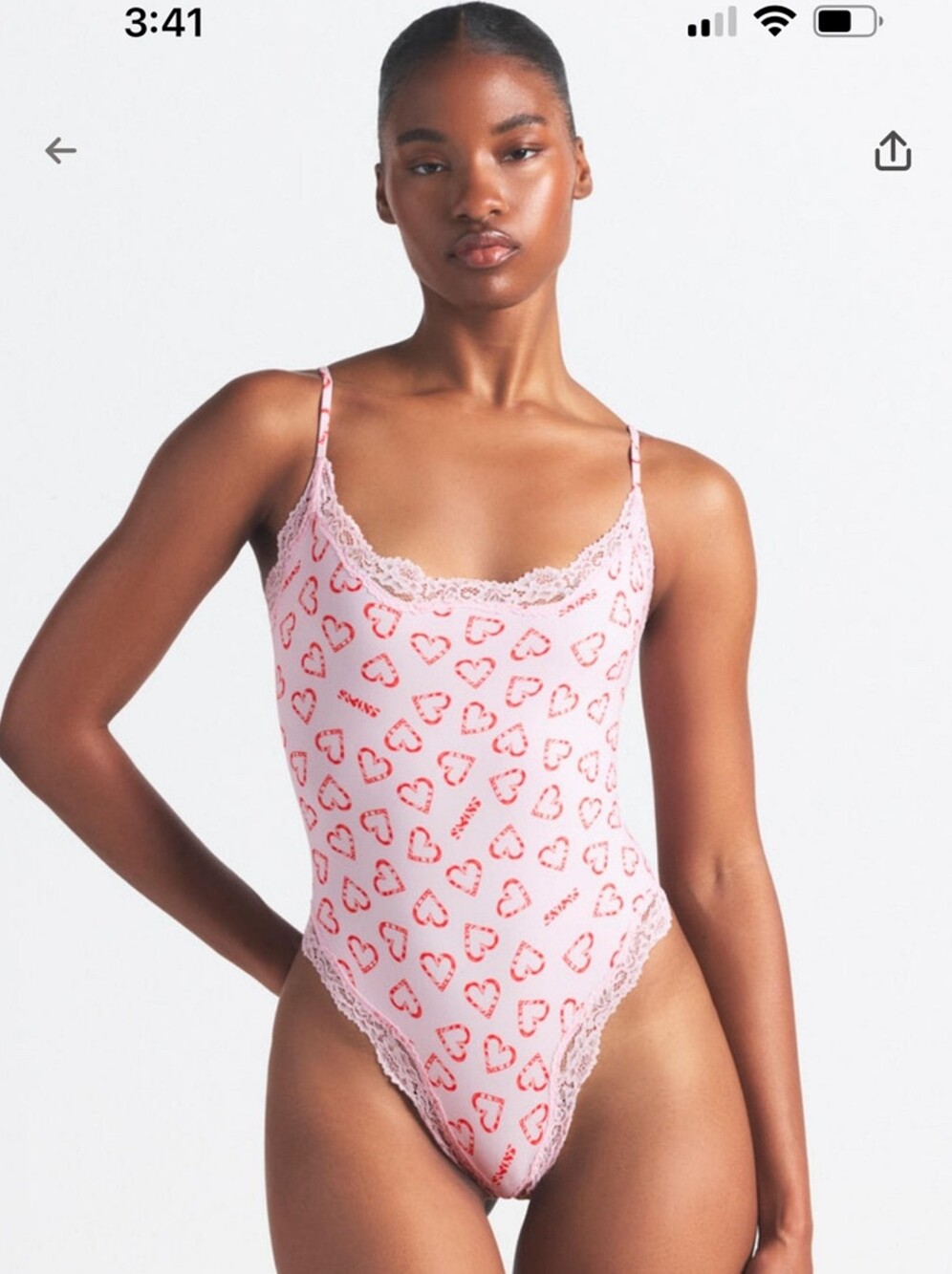 SKIMS Pink Bodysuit with Red Heart Print and Lace Trim Size S Gently Used
